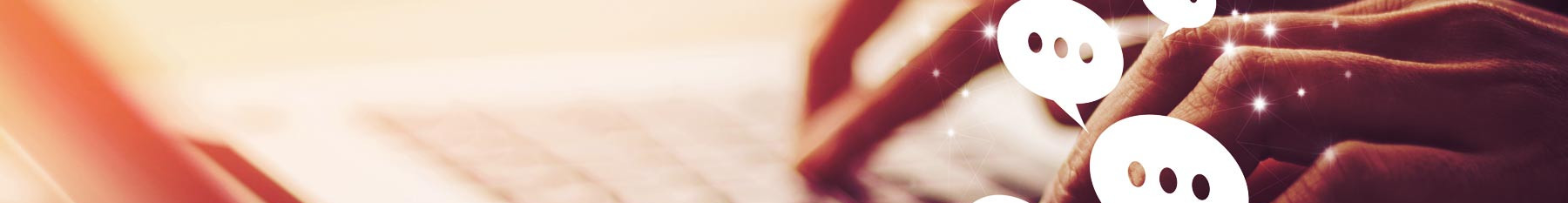 Social media - fingers on keyboard with overlaid comment icons