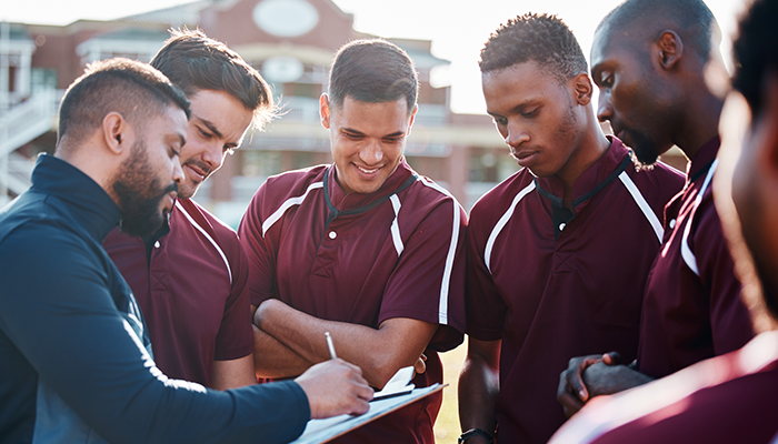 Sports team talk with coach