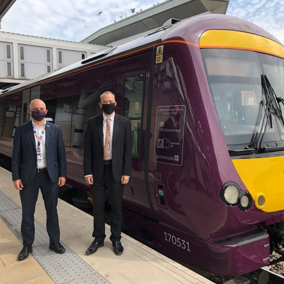Will Rogers and Chris Heaton-Harris at Derby station