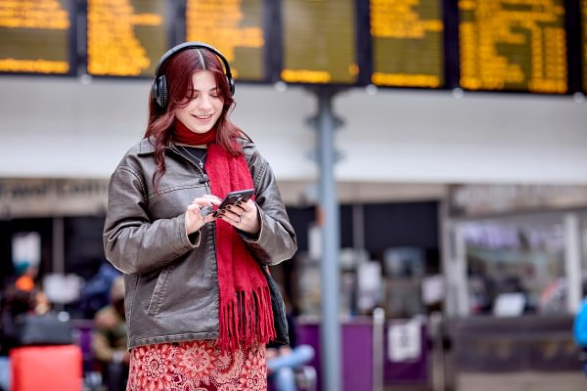 happy passenger at station